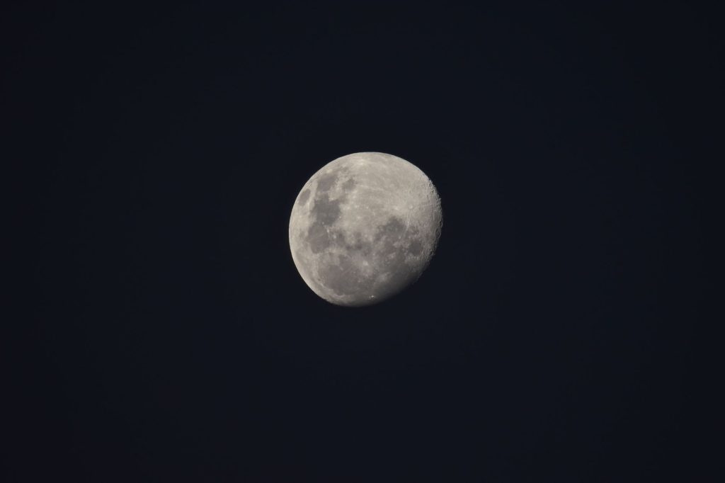 The Physics of Dust: Why Lunar Construction Will Be Harder Than It Looks